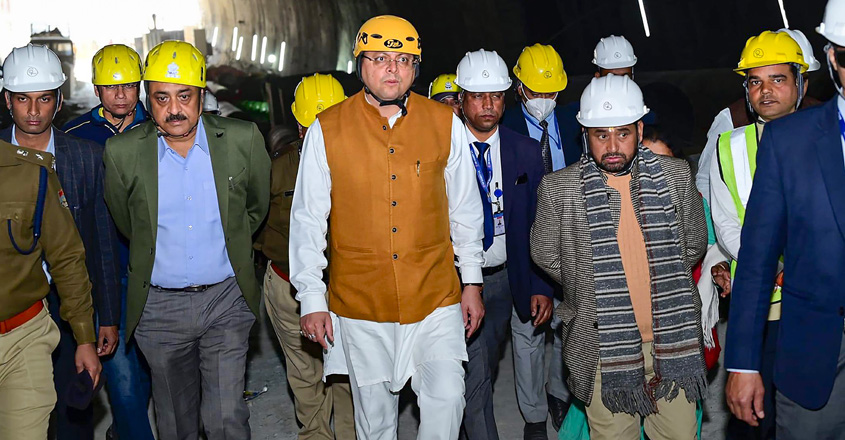 **EDS: IMAGE VIA @pushkardhami** Uttarkashi: Uttarakhand Chief Minister Pushkar Singh Dhami reviews the operation to rescue the 41 workers trapped inside the under-construction tunnel between Silkyara and Dandalgaon on the Brahmakhal-Yamunotri national highway, in Uttarkashi district, Thursday, Nov. 23, 2023. (PTI Photo)(PTI11_23_2023_000095B)