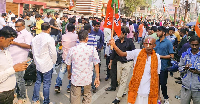 **EDS: TWITTER IMAGE VIA @BJP4Tripura** Agartala: BJP workers gather outside the party office during counting of votes for Tripura Assembly elections, in Agartala, Thursday, March 2, 2023. (PTI Photo)
(PTI03_02_2023_000031B)