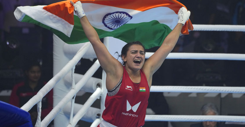 India's Sweety celebrates after wining Elite Women 75-81Kg Light heavy finals against China's Lina Wang, in IBA Women's World Boxing Championships 2023, in New Delhi, India, Saturday, March 25, 2023. (AP Photo/Manish Swarup)