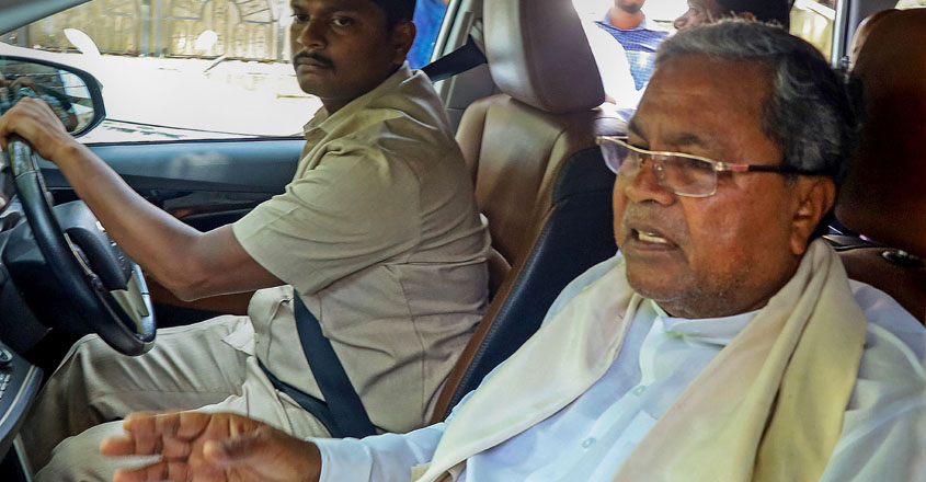 **EDS: BEST QUALITY AVAILABLE**Bengaluru: Congress leader Siddaramaiah leaves his residence for Delhi to meet senior party leaders, a day after the party's newly elected legislators authorised AICC President Mallikarjun Kharge to decide on Karnataka CM pick, in Bengaluru, Monday, May 15, 2023. (PTI Photo)(PTI05_15_2023_000066B)