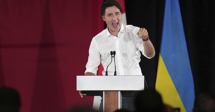 Canadian Prime Minister Justin Trudeau speaks at a rally for Ukrainian President Volodymyr Zelenskyy at the Fort York Armoury in Toronto, Friday, Sept. 22, 2023. (Nathan Denette/The Canadian Press via AP)