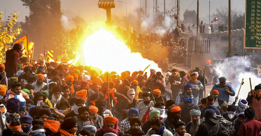 Patiala: A tear gas explodes after being fired upon the protesting farmers during their 'Delhi Chalo' march, near the Punjab-Haryana Shambhu Border, in Patiala district, Wednesday, Feb. 21, 2024. The Haryana Police on Wednesday hurled tear gas shells to disperse farmers from Punjab at Shambhu and Khanauri border points as they tried to move towards the barricades stalling their protest march to Delhi. (PTI Photo) (PTI02_21_2024_000148A)