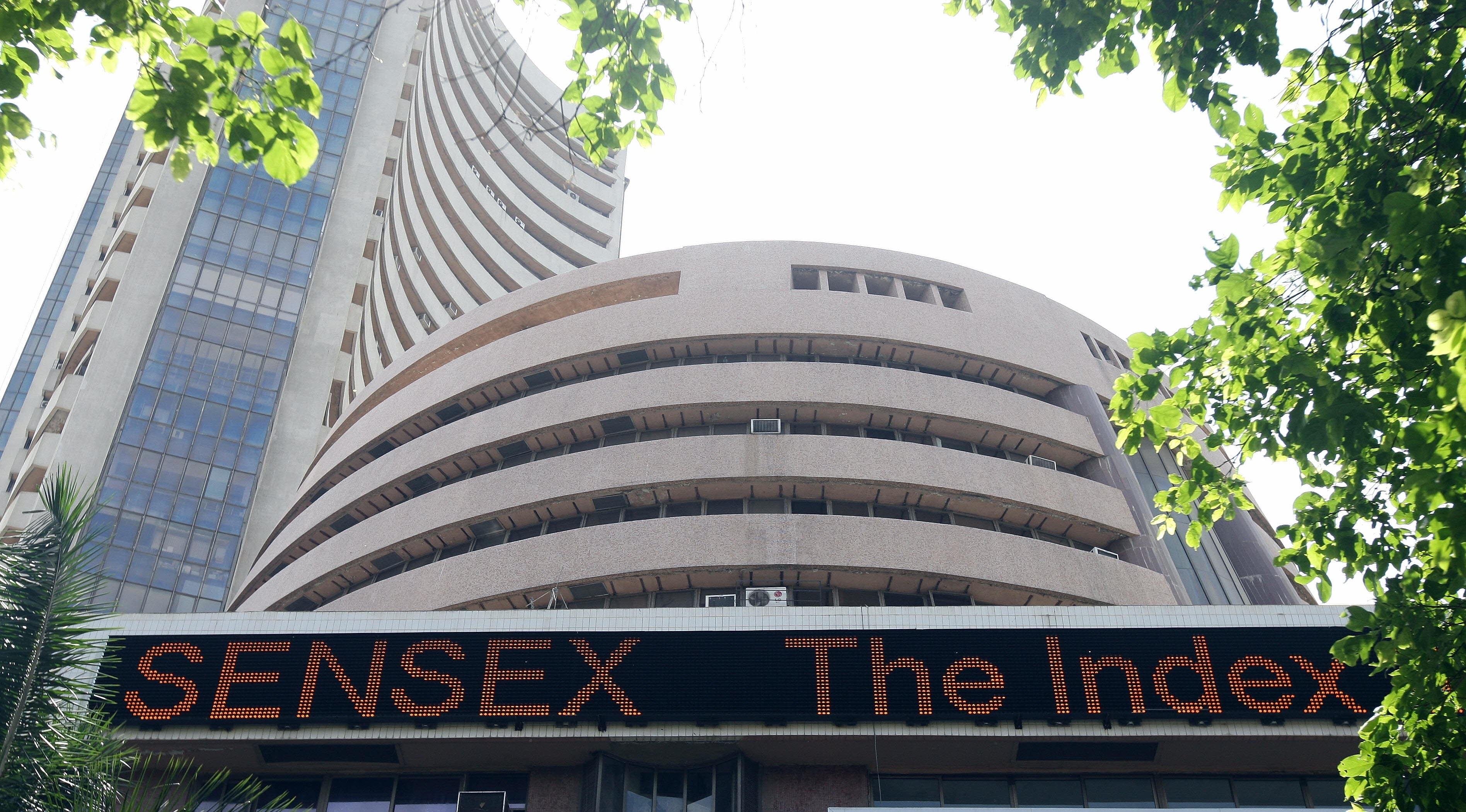 A ticker on the facade of the Bombay Stock Exchange (BSE) shows India's benchmark 30-share index- SENSEX in Mumbai on May 6, 2008.  A stock market investment advisor has filed a case against the Mumbai stock exchange claiming ownership over the term Sensex, which is used to describe one of the country's most popular indices. The market advisor, Deepak Mohini has in his legal notice sought that the court grant him exclusive ownership to the trademark "Sensex".    AFP PHOTO/ Indranil MUKHERJEE