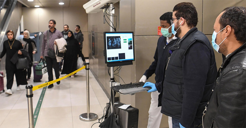 Temperature-scanners-are-used-to-screen-passengers Temperature-scanners-are-used-to-screen-passengers