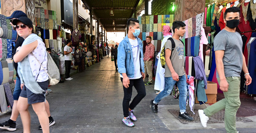 people-walking-past-shops-845 people-walking-past-shops-845