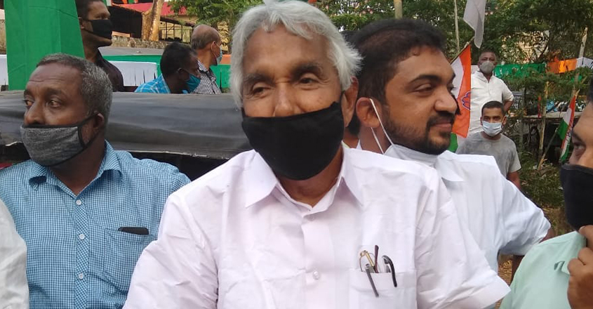 oommen-chandy-black-mask oommen-chandy-black-mask