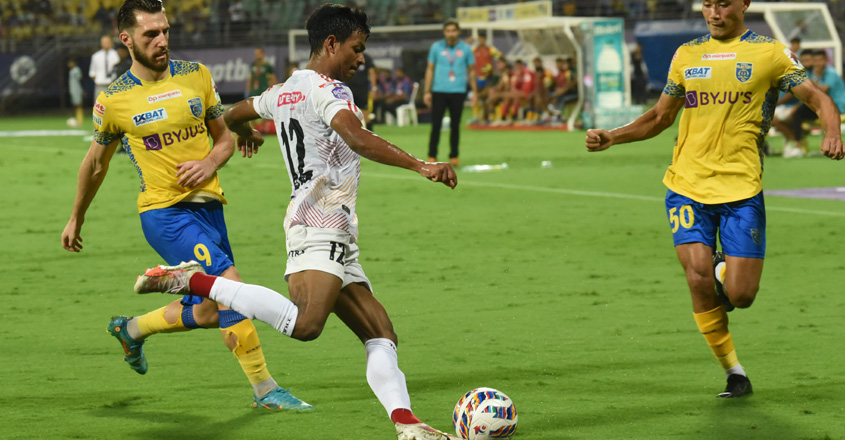 Kochi: Players of Kerala Blasters FC (yellow) and East Bengal FC vie for the ball during an Indian Super League (ISL) 2023-24 season football match, at the Jawaharlal Nehru International Stadium, in Kochi, Wednesday, April 3, 2024. (PTI Photo) (PTI04_03_2024_000332B)