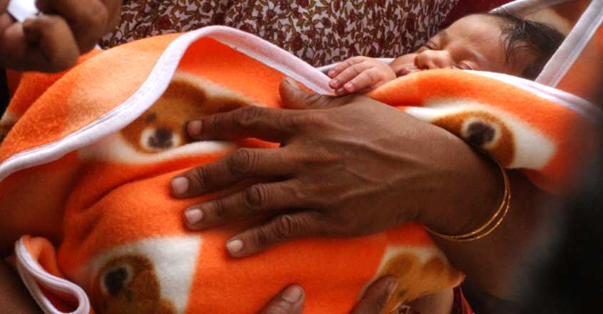 New born baby at Kozhikode Medical Collage - Photo - James Arpoo New born baby at Kozhikode Medical Collage - Photo - James Arpoo