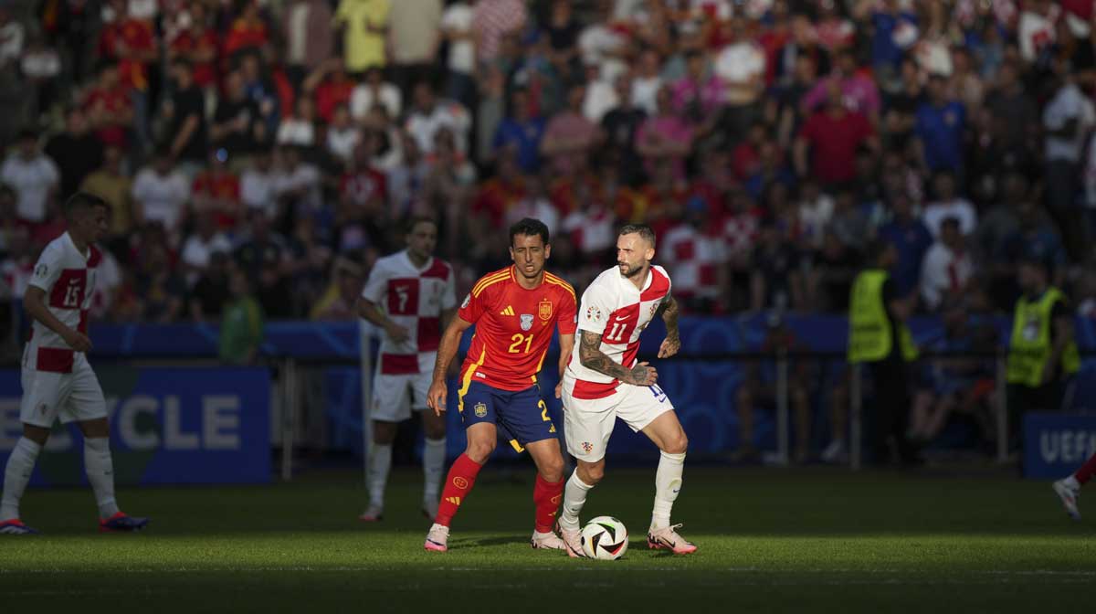 Croatia's Marcelo Brozovic, right, and Spain's Mikel Oyarzabal compete for the ball during a Group B match between Spain and Croatia at the Euro 2024