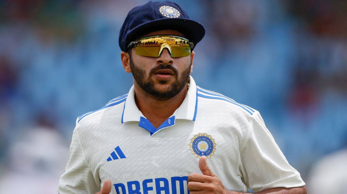 India's Shardul Thakur runs on the field during the third day of the first cricket Test match between South Africa and India at SuperSport Park in Centurion on December 28, 2023. (Photo by PHILL MAGAKOE / AFP)