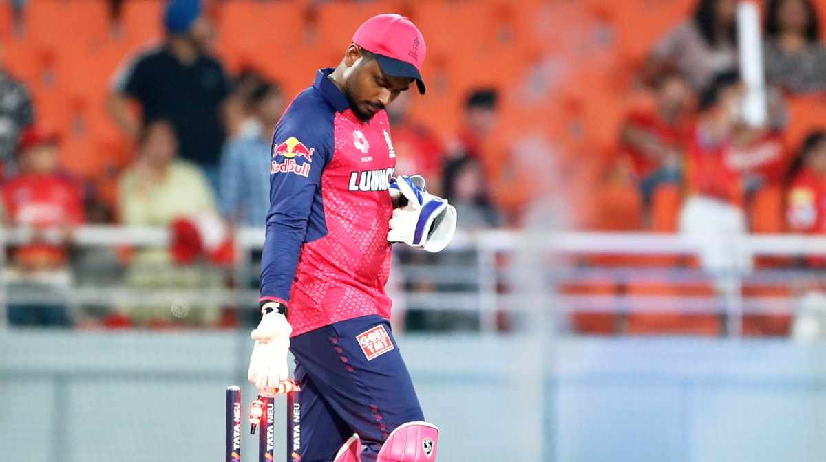 Rajasthan Royals' captain Sanju Samson removes the bails after his team won the Indian Premier League cricket match against Punjab Kings at Maharaja Yadavindra Singh Cricket Stadium in Mohali, India, Sunday, April 6, 2025. (AP Photo/Surjeet Yadav)
