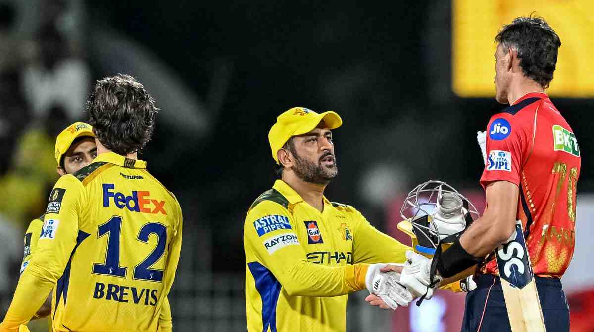 Chennai Super Kings' captain MS Dhoni (C) shakes hands with Punjab Kings' Marco Jansen (R) at the end of the Indian Premier League (IPL) Twenty20 cricket match between Chennai Super Kings and Punjab Kings at the MA Chidambaram Stadium in Chennai on April 30, 2025. (Photo by R.Satish BABU / AFP) / -- IMAGE RESTRICTED TO EDITORIAL USE - STRICTLY NO COMMERCIAL USE --