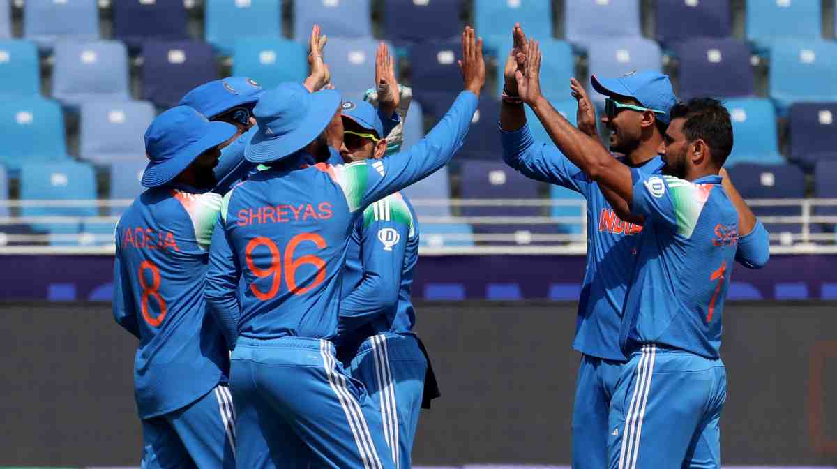 Cricket - ICC Men's Champions Trophy - Group A - Bangladesh v India - Dubai International Stadium, Dubai, United Arab Emirates - February 20, 2025India's Mohammed Shami celebrates with teammates after taking the wicket of Bangladesh's Mehidy Hasan Miraz, caught out by Shubman Gill REUTERS/Satish Kumar