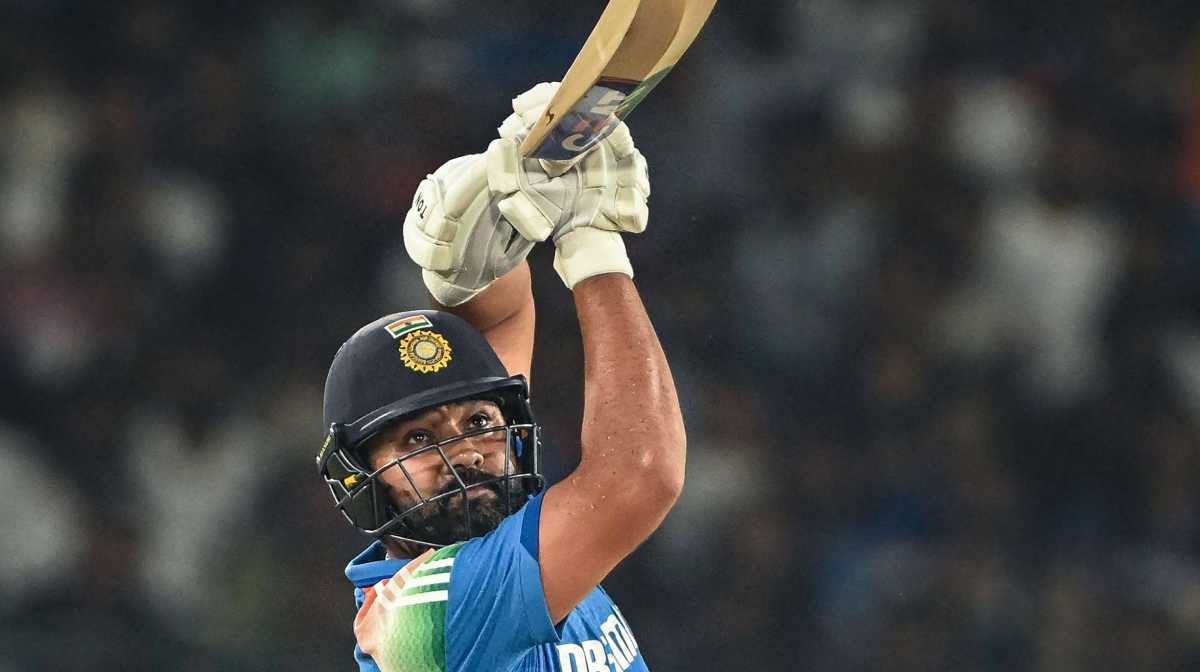 India's captain Rohit Sharma watches the ball after playing a shot during the second one-day international (ODI) cricket match between India and England at the Barabati Stadium in Cuttack on February 9, 2025. (Photo by DIBYANGSHU SARKAR / AFP) / -- IMAGE RESTRICTED TO EDITORIAL USE - STRICTLY NO COMMERCIAL USE --